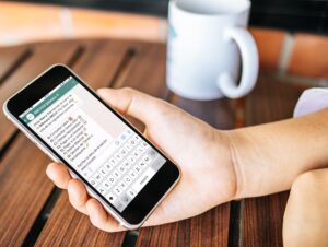 Woman using smartPhone PSD Mockup